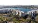 Stunning aerial view of condos with waterfront views and manicured grounds at 7902 Sailboat Key S Blvd # 206, South Pasadena, FL 33707