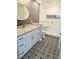 Bathroom with designer tile, a glass-enclosed shower, and a modern vanity at 7902 Sailboat Key S Blvd # 206, South Pasadena, FL 33707