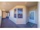 Exterior view of building entrance and walkway featuring Unit 206 at 7902 Sailboat Key S Blvd # 206, South Pasadena, FL 33707