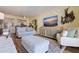 Inviting living room featuring stylish decor, comfortable seating, and a modern entertainment center at 7902 Sailboat Key S Blvd # 206, South Pasadena, FL 33707