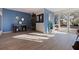 Well-lit lobby area with light wood floors, modern paint, waiting area, and elevator access at 7902 Sailboat Key S Blvd # 206, South Pasadena, FL 33707