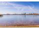 Beautiful waterfront view showcasing calm waters and distant waterfront homes under a partly cloudy sky at 7902 Sailboat Key S Blvd # 206, South Pasadena, FL 33707
