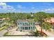 Aerial view of two-story home with mature trees and lush landscaping in a desirable neighborhood at 805 17Th Ne Ave, St Petersburg, FL 33704