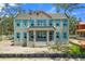 Two-story home with light blue trim and a partially completed exterior ready to be customized to your liking at 805 17Th Ne Ave, St Petersburg, FL 33704