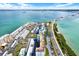 Aerial view of the complex with waterfront views and close proximity to beaches at 9 Forbes Pl # 206, Dunedin, FL 34698