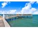 Private dock on the water with access for boating and fishing activities at 9 Forbes Pl # 206, Dunedin, FL 34698