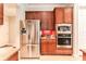 Modern kitchen showcasing stainless steel appliances, and updated countertops at 15944 Ternglade Dr, Lithia, FL 33547