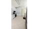 Charming kitchen with stainless steel appliances, white cabinets, and tiled flooring at 1609 Shady Oaks Dr, Oldsmar, FL 34677