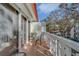 Charming balcony with patio furniture and serene views of the surrounding landscape at 2612 Pearce Dr # 310, Clearwater, FL 33764