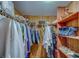 Well-organized walk-in closet with ample shelving and hanging space for clothes and accessories at 2612 Pearce Dr # 310, Clearwater, FL 33764