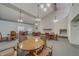 Bright clubhouse featuring multiple tables and chairs, and brick fireplace at 2612 Pearce Dr # 310, Clearwater, FL 33764