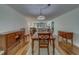 Spacious dining room with hardwood floors and access to the outdoor space at 2612 Pearce Dr # 310, Clearwater, FL 33764