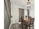 Cozy dining room featuring a decorative wall, chandelier, and wood table with seating for four at 4537 22Nd N St, St Petersburg, FL 33714