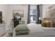 Comfortable bedroom with a desk, ceiling fan, and a view of the outdoors at 6307 113Th E Ter, Parrish, FL 34219