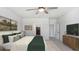 Serene bedroom with lots of light, neutral tones, and open view through the home at 6307 113Th E Ter, Parrish, FL 34219