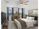 Tranquil bedroom featuring light-toned decor, natural light, and a soothing color palette at 6307 113Th E Ter, Parrish, FL 34219