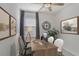 Bright home office with lots of sunlight, modern decor, and light-toned walls at 6307 113Th E Ter, Parrish, FL 34219