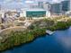 Captivating aerial view of an arena next to a tranquil waterfront and lush greenery at 700 S Harbour Island Blvd # 738, Tampa, FL 33602