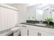 Functional bathroom featuring a granite countertop vanity, contemporary fixtures, and efficient use of space at 700 S Harbour Island Blvd # 738, Tampa, FL 33602