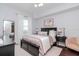 This is a bedroom with neutral tones, including a luxurious bed and stylish furnishings and bright window view at 700 S Harbour Island Blvd # 738, Tampa, FL 33602