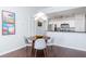 Cozy dining area connected to a modern kitchen, illuminated by a unique pendant light fixture at 700 S Harbour Island Blvd # 738, Tampa, FL 33602