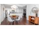 Charming dining area featuring a round wooden table and stylish pendant lighting at 700 S Harbour Island Blvd # 738, Tampa, FL 33602