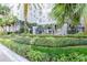 Landscaped grounds feature lush green bushes, seasonal flowers, and palm trees at 700 S Harbour Island Blvd # 738, Tampa, FL 33602