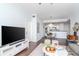 Open-concept living area showcasing a dining space and a glimpse of the modern kitchen at 700 S Harbour Island Blvd # 738, Tampa, FL 33602