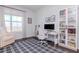 Comfortable office with a sleek desk, bookcase, and cozy chair by a sunny window for a bright workspace at 700 S Harbour Island Blvd # 738, Tampa, FL 33602