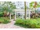 Beautiful pergola with lush landscaping and bench seating, creating a tranquil outdoor space at 700 S Harbour Island Blvd # 738, Tampa, FL 33602