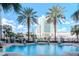 Stunning swimming pool with palm trees, city views, and ample lounge space for ultimate relaxation at 700 S Harbour Island Blvd # 738, Tampa, FL 33602