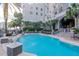 Stunning building offers a pristine swimming pool surrounded by mature palm trees and classic architecture at 700 S Harbour Island Blvd # 738, Tampa, FL 33602