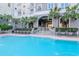 Beautiful condo building offers a pool surrounded by palm trees and classic architecture at 700 S Harbour Island Blvd # 738, Tampa, FL 33602