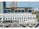 Waterfront view with boats docked and building with rooftop seating area at 700 S Harbour Island Blvd # 738, Tampa, FL 33602