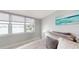 Bright bedroom with waterfront views and a calming color palette at 7910 Sun Island S Dr # 305, South Pasadena, FL 33707