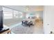 Serene bedroom with large windows, a cozy bed, and stylish decor at 7910 Sun Island S Dr # 305, South Pasadena, FL 33707