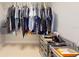 Organized walk-in closet with ample shelving, hanging space, and metal drawer units for efficient storage at 7910 Sun Island S Dr # 305, South Pasadena, FL 33707