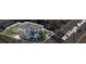 An aerial view of the property showcases the surrounding neighborhood and street access at 902 W Sligh Ave, Tampa, FL 33604