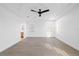 Bright bedroom with modern ceiling fan, recessed lighting, and horizontally striped blinds at 902 W Sligh Ave, Tampa, FL 33604