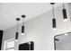 Modern lighting fixtures hang from the ceiling at 902 W Sligh Ave, Tampa, FL 33604