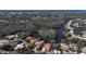 Beautiful aerial view of the community and nature, showing a lake behind homes at 1290 Clays Trl, Oldsmar, FL 34677