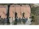 Aerial view of the community showcasing the tiled roofs, driveways, and lush landscaping at 1290 Clays Trl, Oldsmar, FL 34677