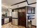 Kitchen showcasing stainless steel appliances and dark cabinetry at 1290 Clays Trl, Oldsmar, FL 34677