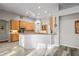 Spacious kitchen with wooden cabinets and ample counter space for cooking and entertaining at 1405 Kensington Woods Dr, Lutz, FL 33549