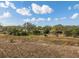 Scenic aerial view of the home and surrounding landscape at 1472 Ivydale Rd, Spring Hill, FL 34606