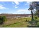 Expansive backyard with view of marsh, offering privacy and natural beauty at 1472 Ivydale Rd, Spring Hill, FL 34606