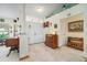Inviting foyer with marble floors, complemented by classic wood furnishings at 1472 Ivydale Rd, Spring Hill, FL 34606