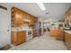 Open kitchen with a breakfast nook, stainless steel refrigerator and white appliances at 1472 Ivydale Rd, Spring Hill, FL 34606