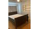 Bedroom featuring hardwood floors and a large bed at 1811 Ridge S Rd, Largo, FL 33778