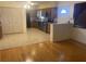 Well-equipped kitchen featuring stainless steel appliances, wooden cabinets, and an adjacent breakfast bar at 1811 Ridge S Rd, Largo, FL 33778